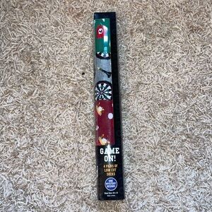 4 pairs of game themed low cut socks. Size 6.5-12.